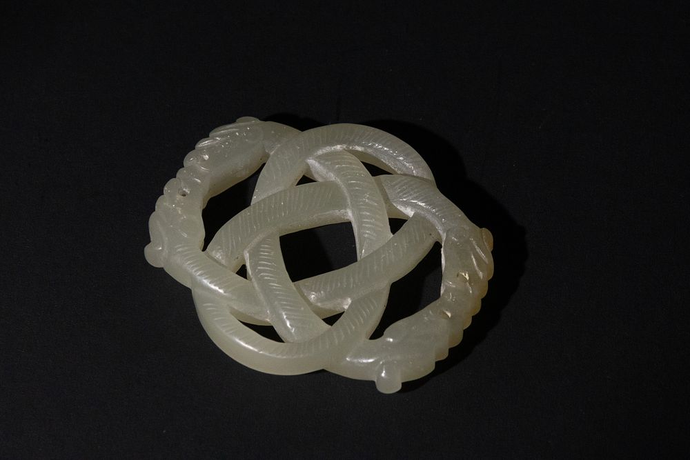 Lot 315: A Chinese Pale Celadon Jade Interlocking Dragon Plaque,...
