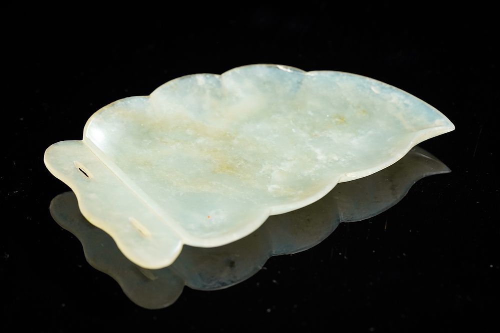 Lot 347: A Chinese Pale Green Jade Plaque in the...