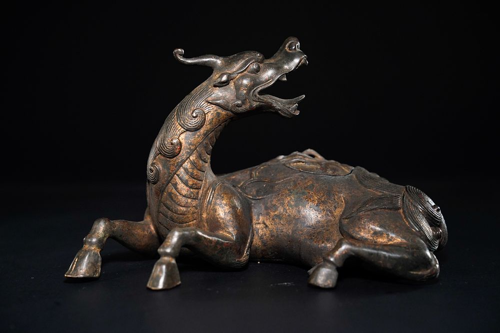 Lot 356: A Chinese Bronze Dragon-Form Censer, 20th Century.
