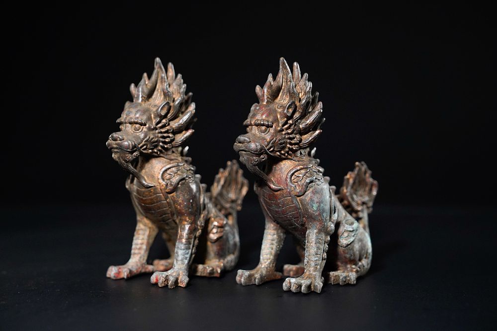 Lot 357: A Pair of Chinese Bronze Guardian Beasts, 20th...