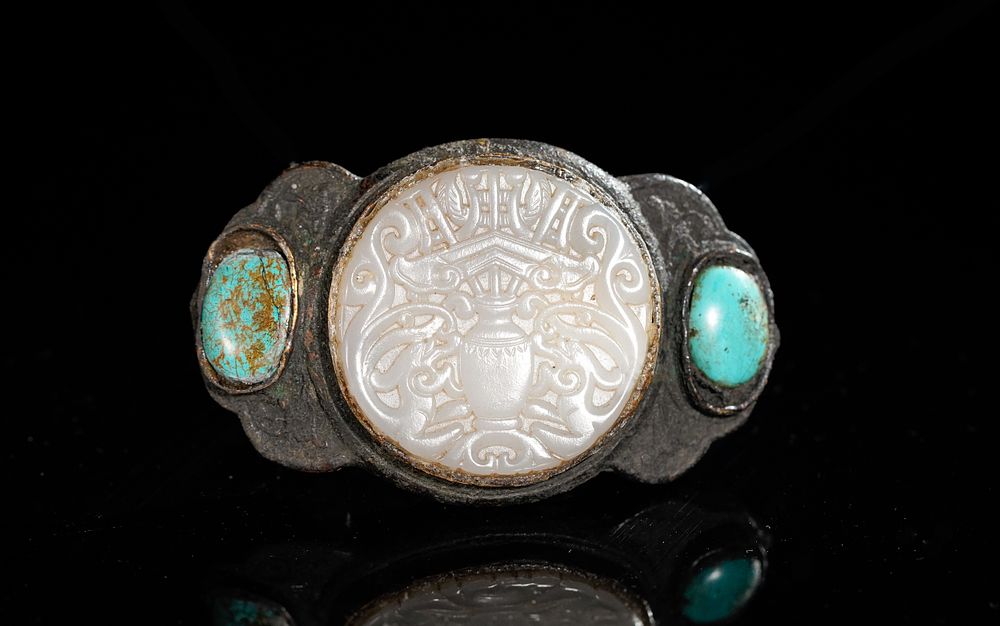 Lot 362: A Chinese Jade and Turquoise-Inlaid Belt Buckle.