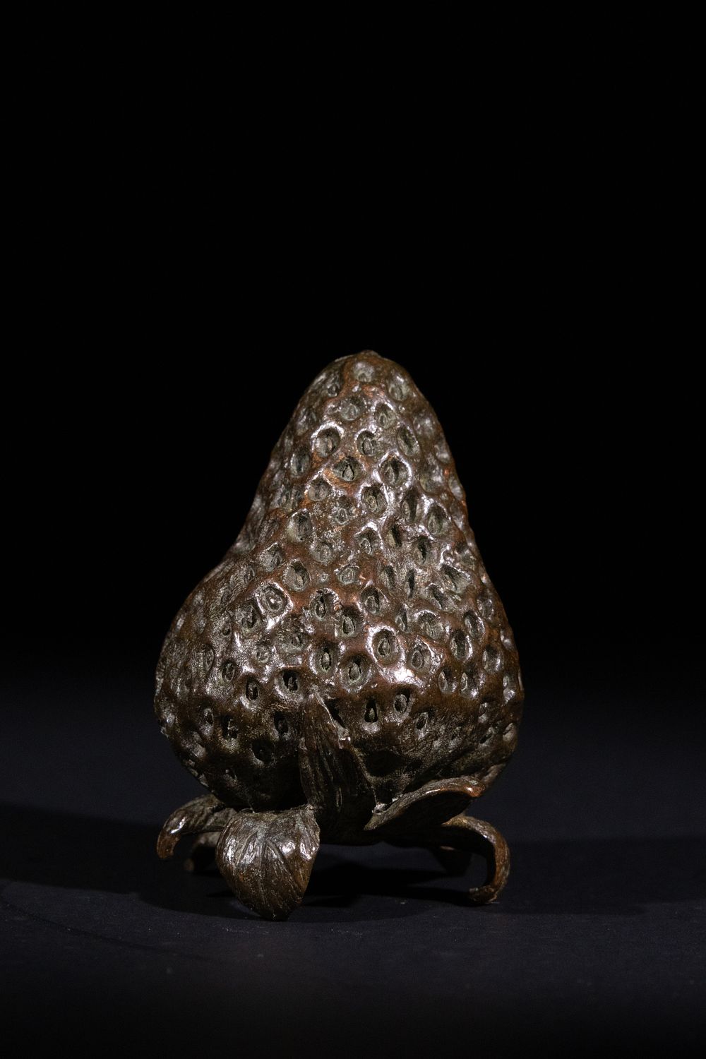 Lot 372: A Japanese Bronze Strawberry Okimono, with Six Character...