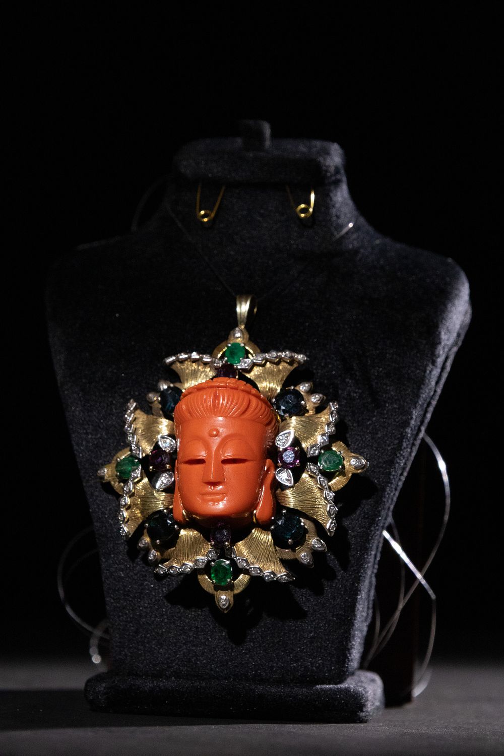 Lot 380: A Diamond and Gem-Set Buddhist Pendant Featuring a...