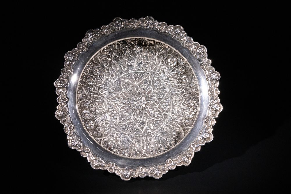 Lot 383: A Silver Repoussé Floral Bowl with Scalloped Rim,...