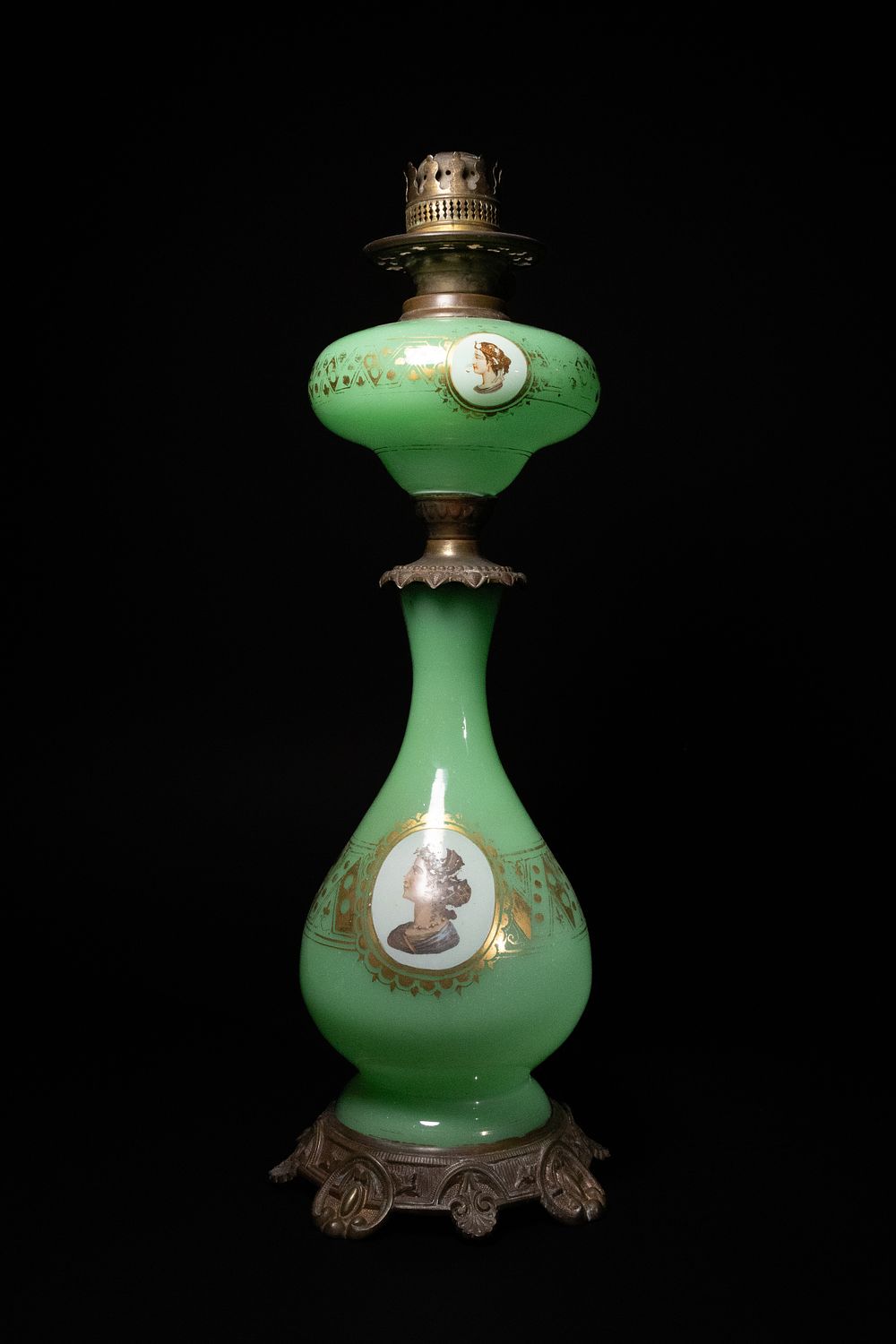 Lot 389: A Bohemian Green Uranium Glass Oil Lamp with...