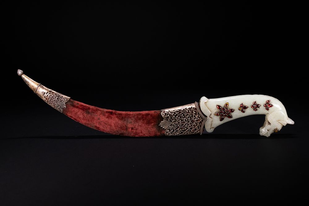 Lot 166: An Indian Jade-Hilted Dagger with Velvet Sheath.