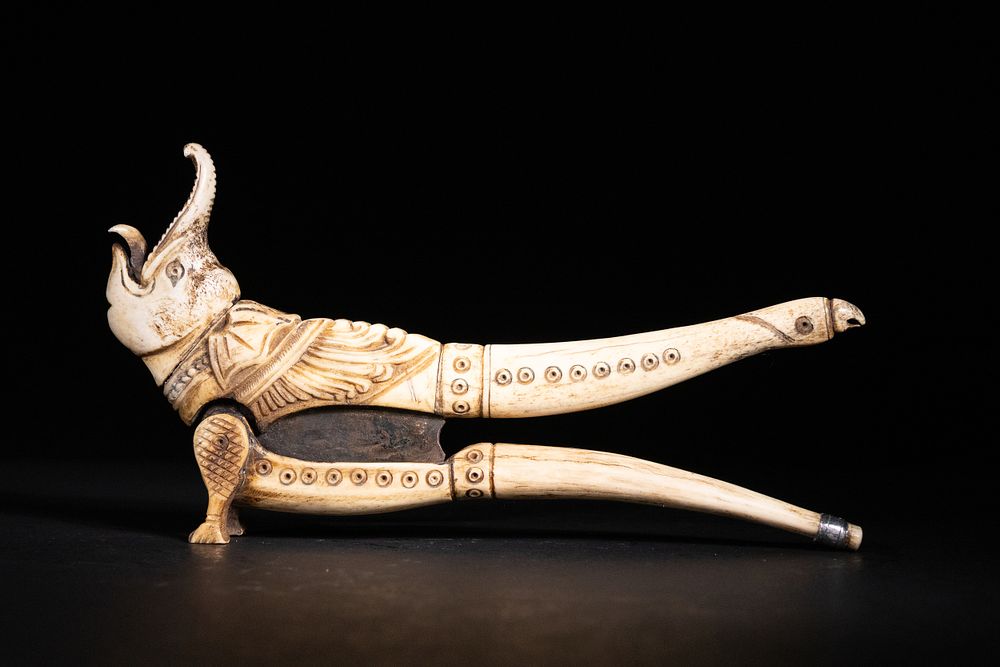Lot 175: A Mughal Bone Nutcracker Carved as a Royal...