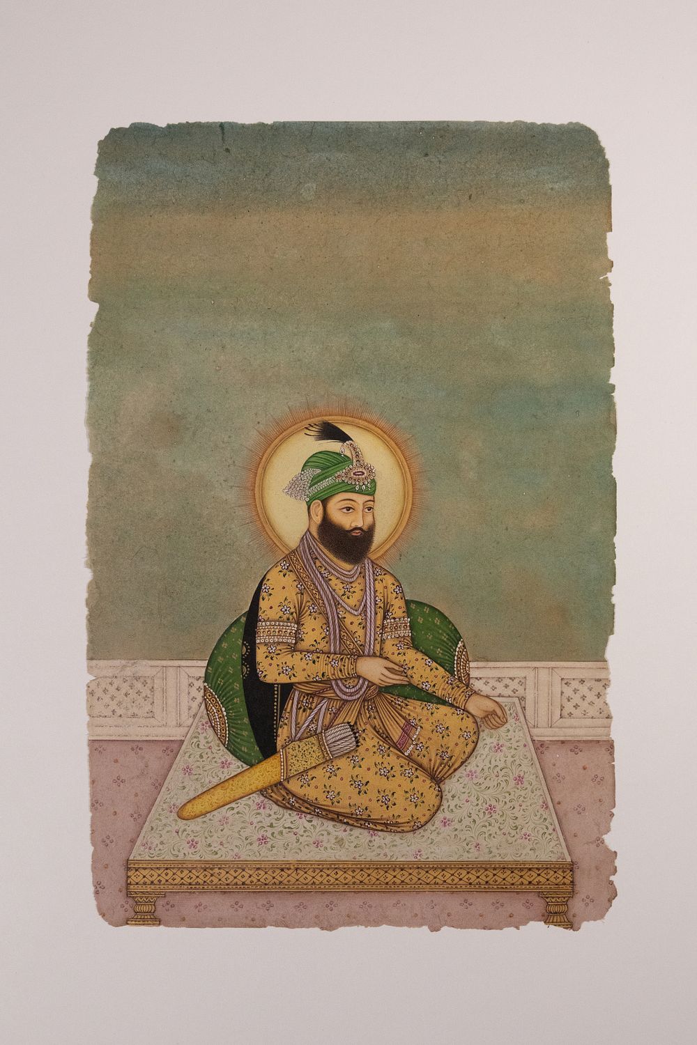 Lot 181: A Rajasthani Portrait of a Nobleman in Floral...