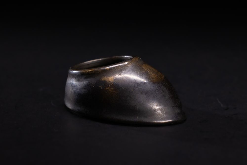 Lot 195: A Mughal Style Bronze Archer Ring.