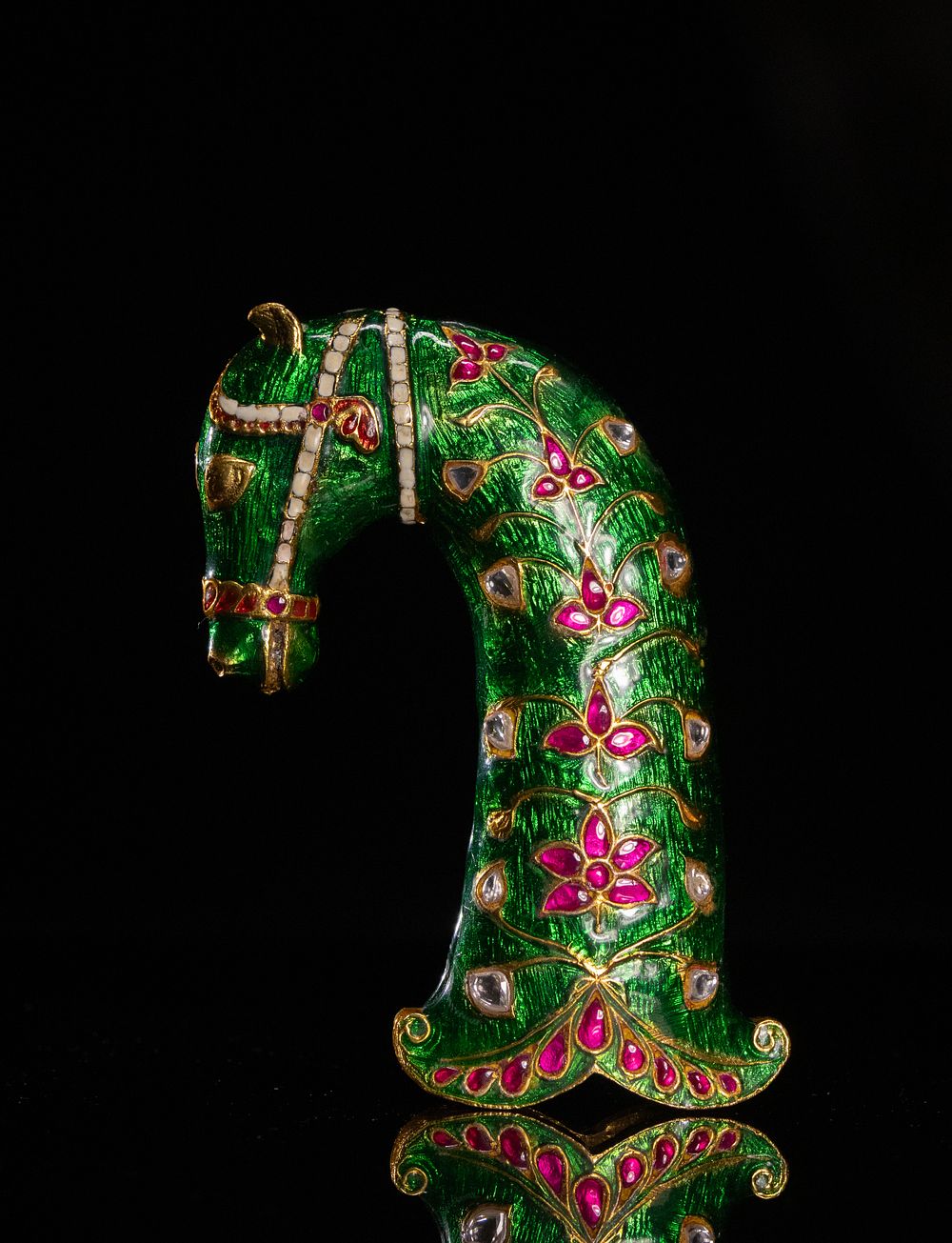 Lot 197: A Mughal Style Enamelled Metal Dagger Handle with...