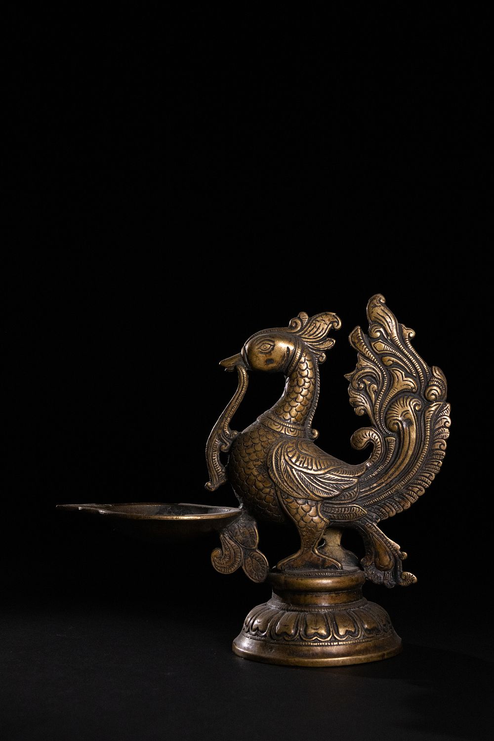 Lot 199: An Indian Bronze Peacock Oil Lamp.