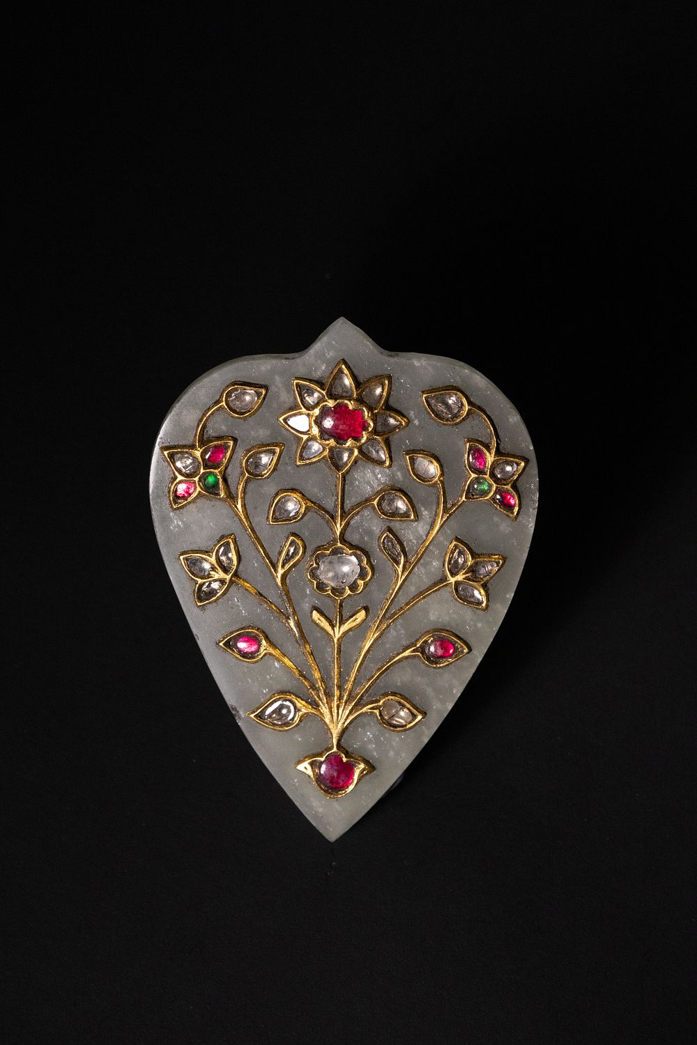 Lot 200: A Mughal Carved Jade Head Ornament Inset with...