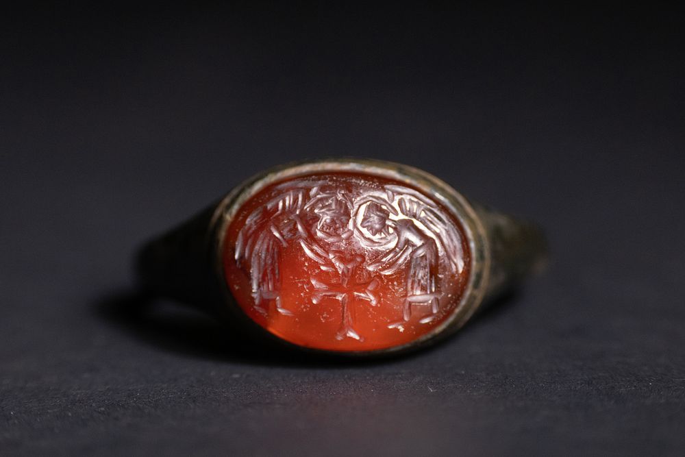 Lot 218: A Byzantine Bronze Ring Set with Agate Intaglio...