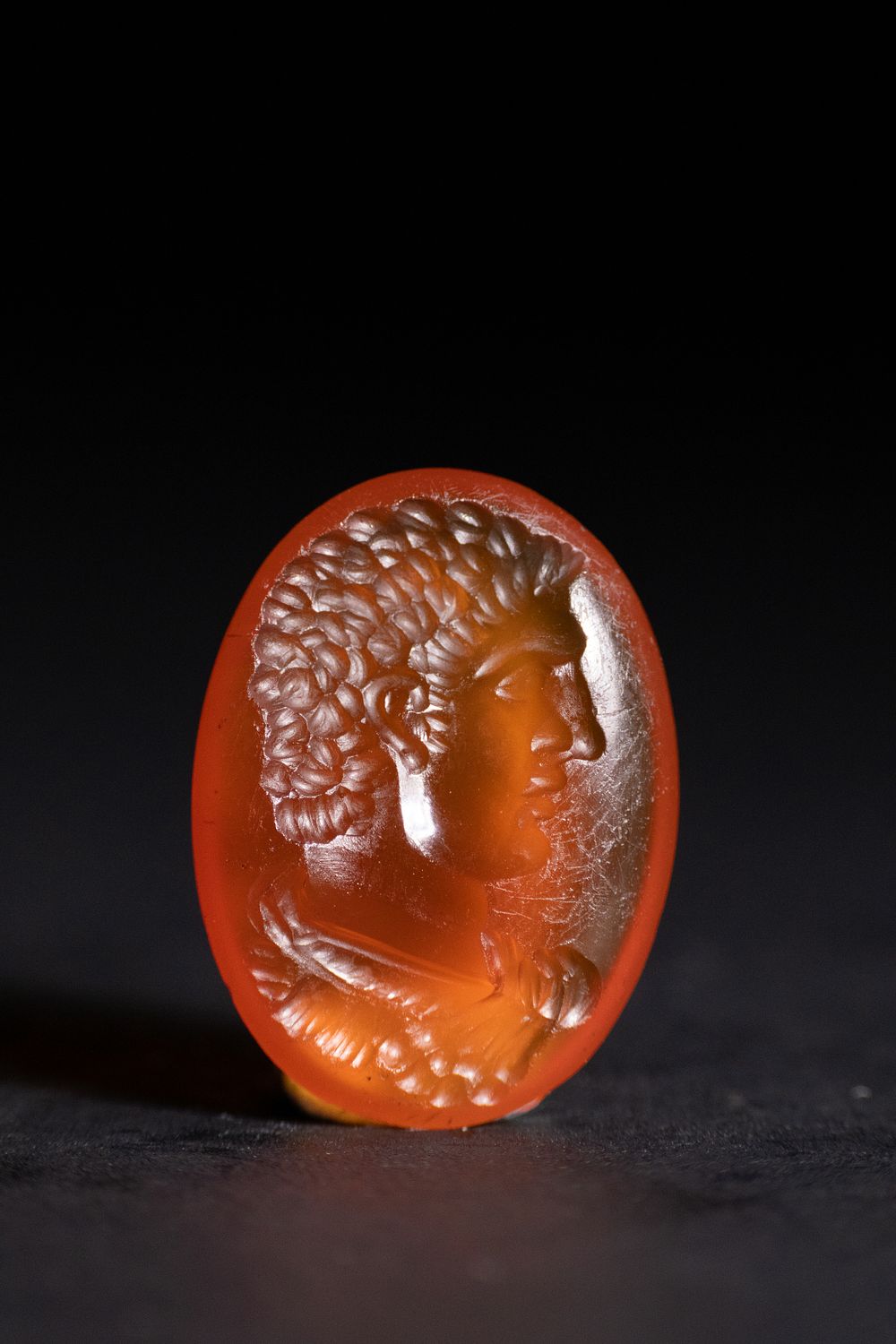 Lot 220: A Roman Agate Intaglio Depicting the Bust of...