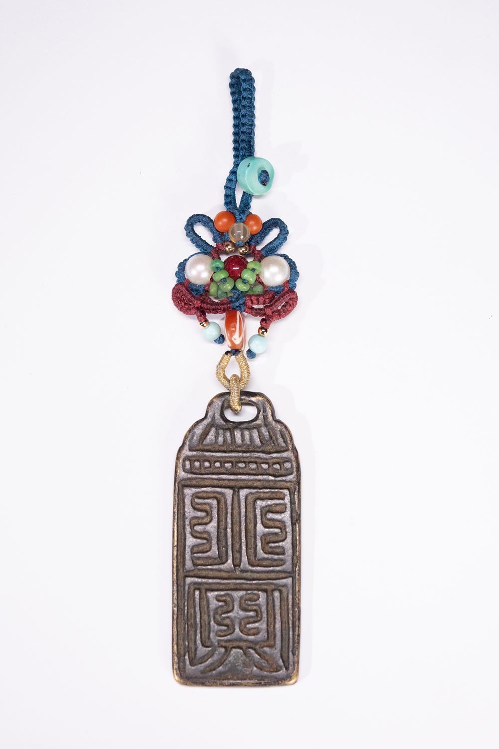 Lot 241: A Tibetan Bronze Pendant with Agate, Amber, Pearl,...
