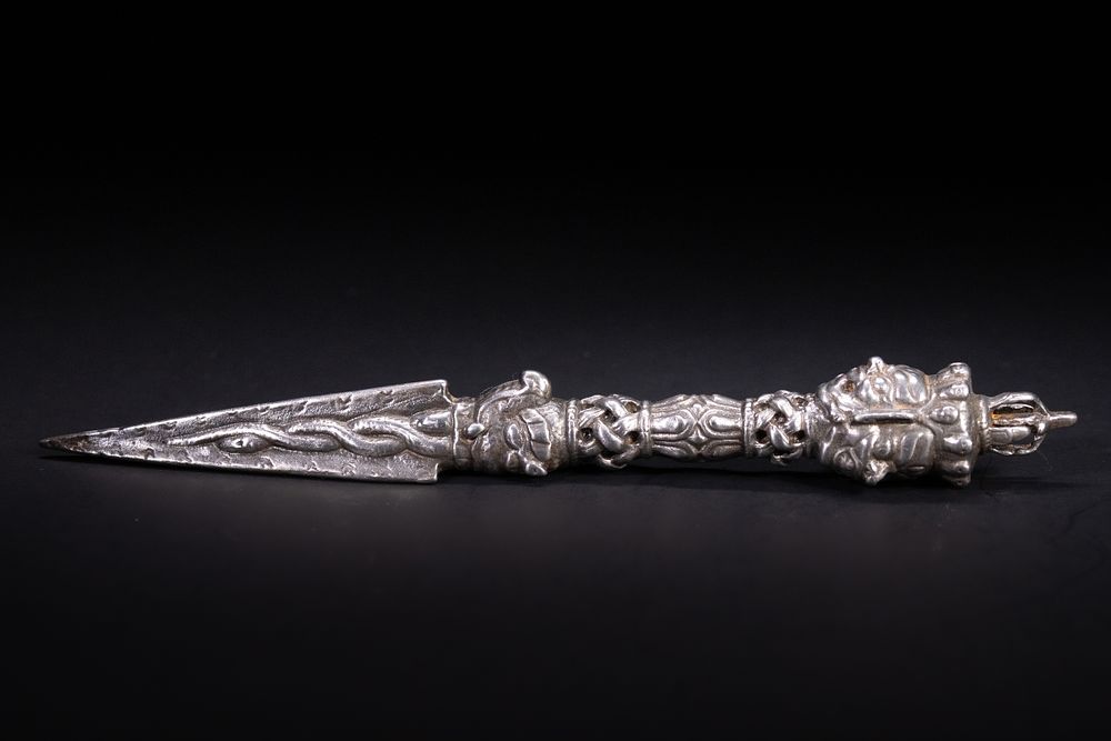 Lot 249: A Tibetan Iron Phurba Ritual Dagger with Wrathful...