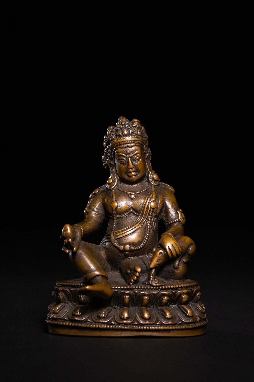 Lot 260: A Tibetan Bronze Figure of Kubera, the Buddhist...