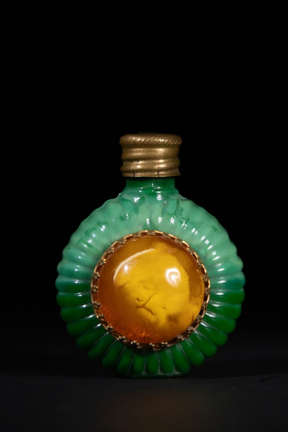 Lot 267: A Chinese Green Glass Snuff Bottle with Amber...