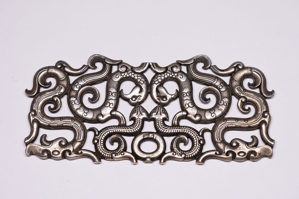 Lot 274: A Chinese White Metal Openwork Plaque with Intertwined...