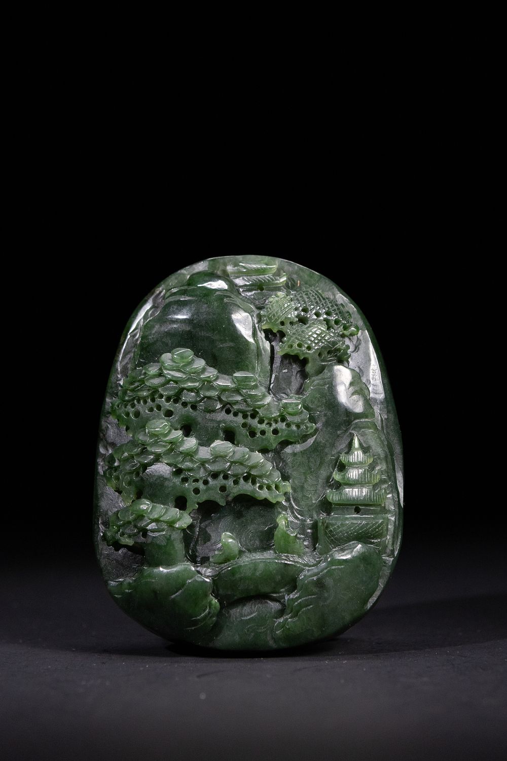 Lot 277: A Chinese Spinach Green Jade Landscape Plaque.