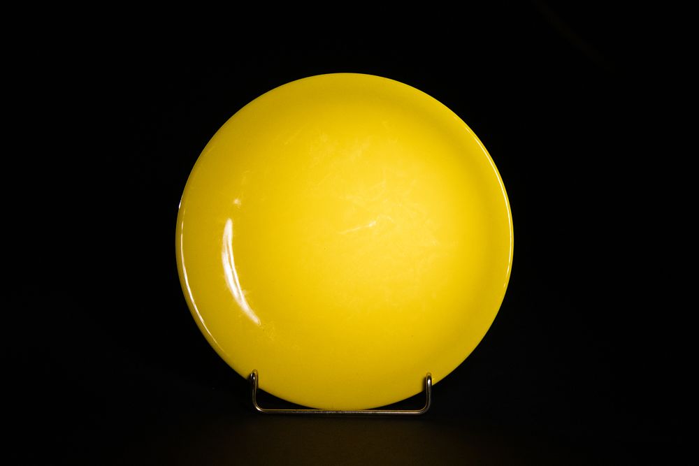 Lot 294: A Chinese Imperial Yellow-Ground Porcelain Dish.