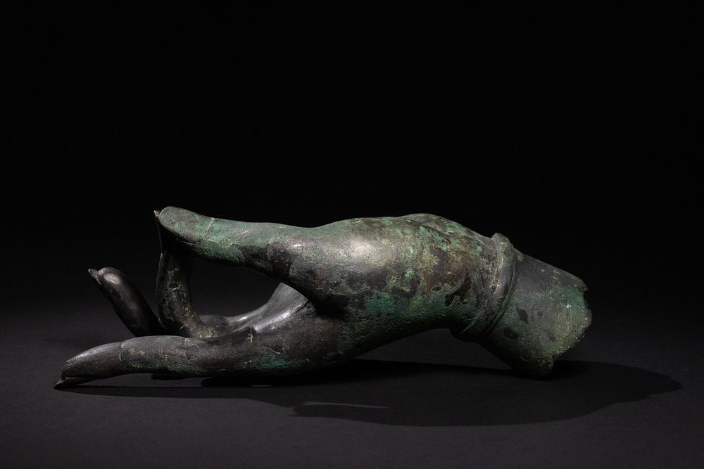 Lot 313: A Chinese Bronze Buddha Hand in Vitarka Mudra,...