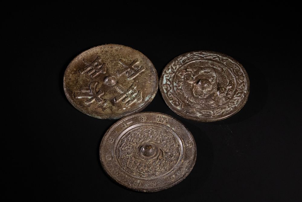 Lot 342: A Lot of Three Chinese Bronze Mirrors with...