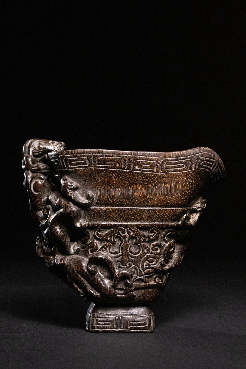 Lot 344: A Chinese Libation Cup with Mythical Beast Motifs...
