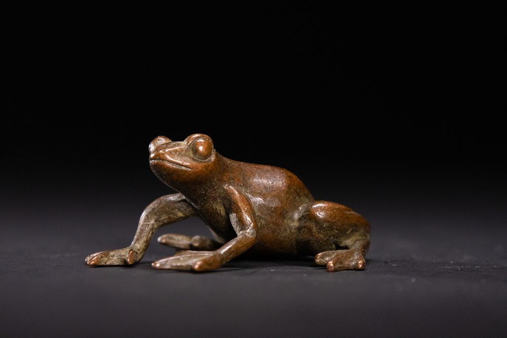 Lot 384: A Japanese Bronze Figure of a Frog.