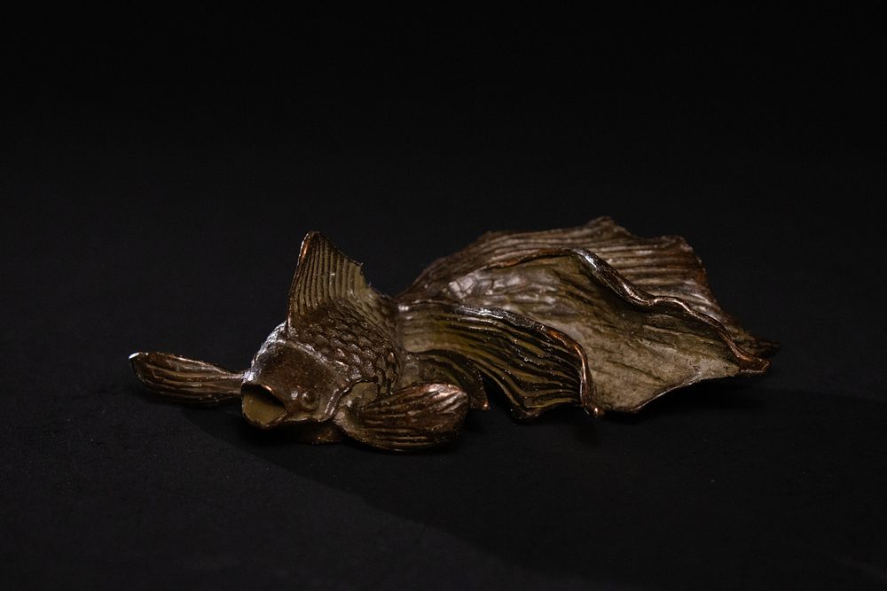 Lot 386: A Japanese Bronze Okimono of a Flowing-Tailed Goldfish.