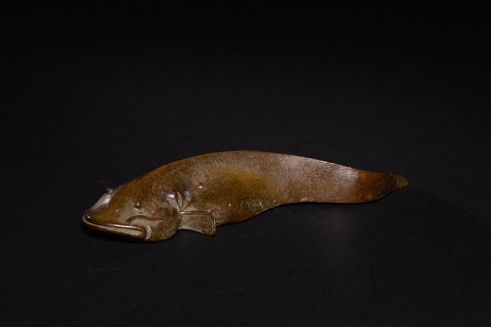 Lot 387: A Japanese Bronze Okimono of a Catfish.