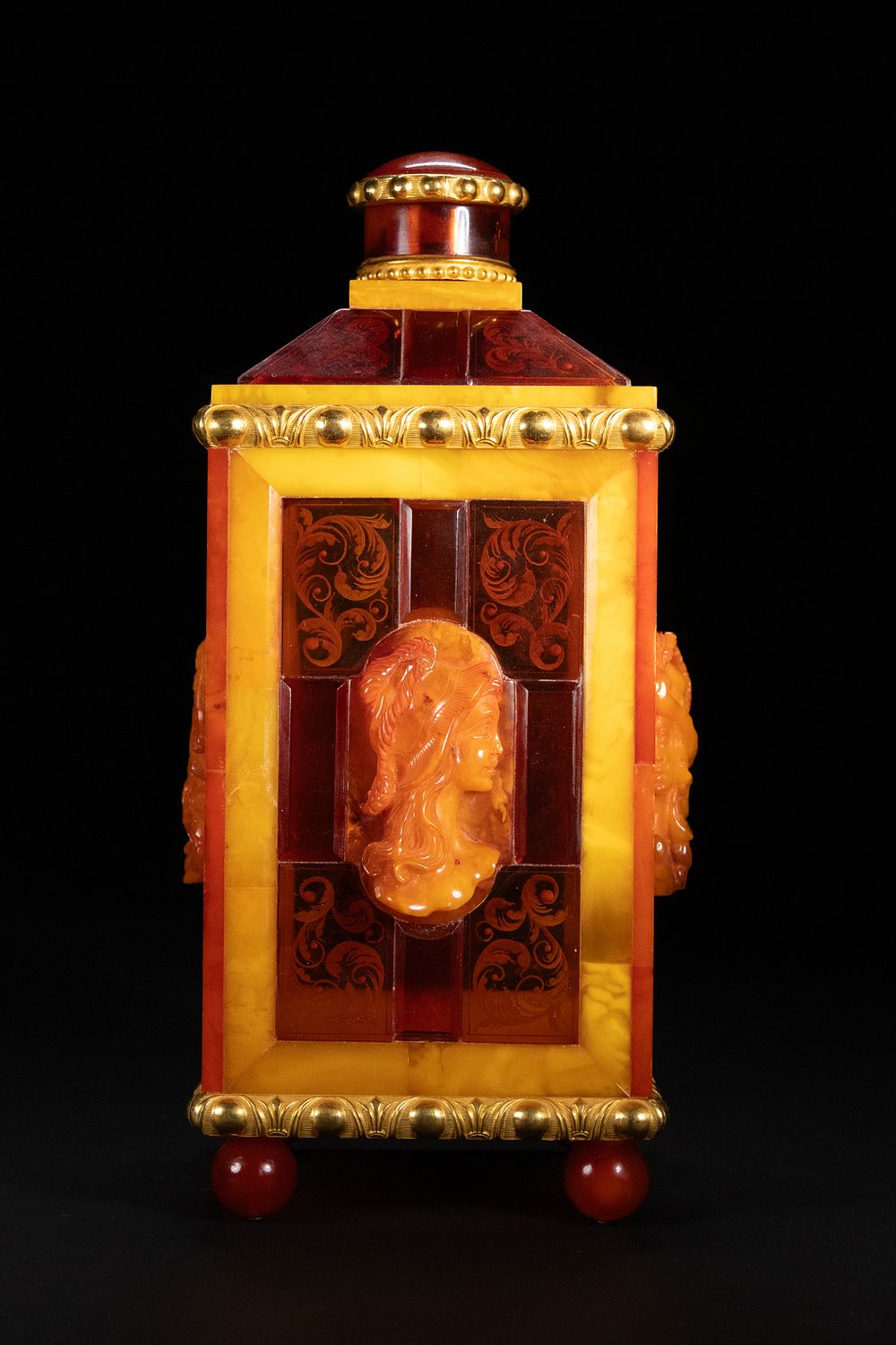 Lot 397: A Continental Carved Amber and Yellow Metal-Mounted Casket.