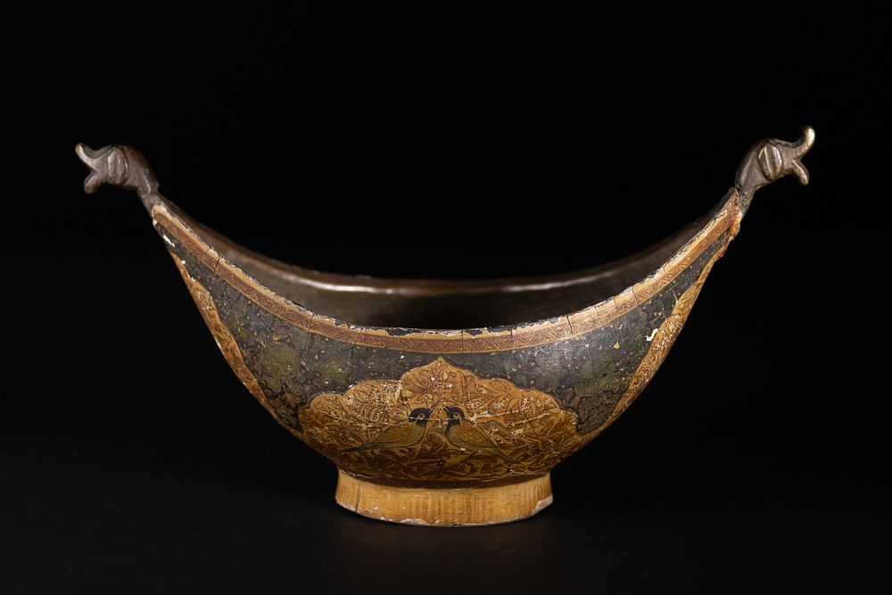 Lot 184: A Kashmiri Lacquered Brass Kashkul, 19th Century.