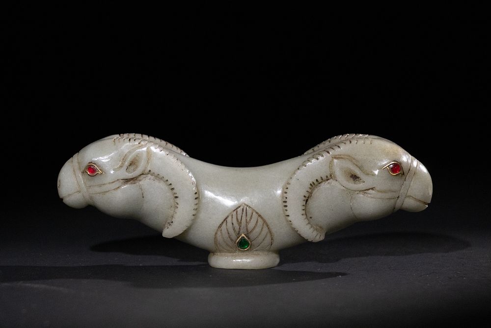 Lot 219: A Mughal Carved Jade Walking Cane Handle with...