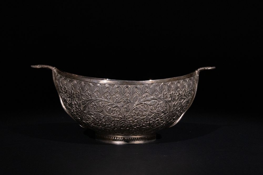 Lot 224: An Indian Kashmiri Silver Kashkul Beggar’s Bowl with...