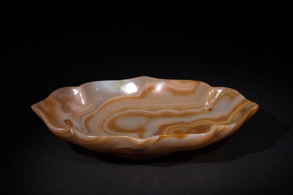 Lot 225: An Indo-Persian Carved Agate Petal-Rimmed Dish.