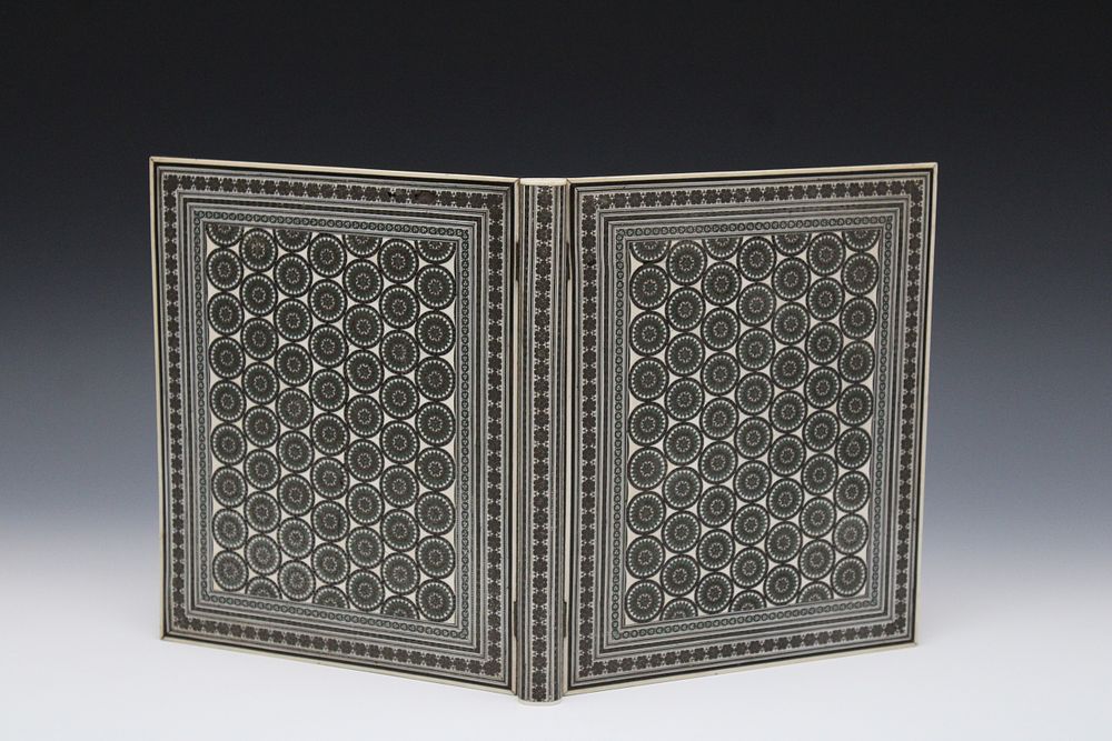 Lot 233: An Indian Gujarat Sadeli Work Bone Document Folder.