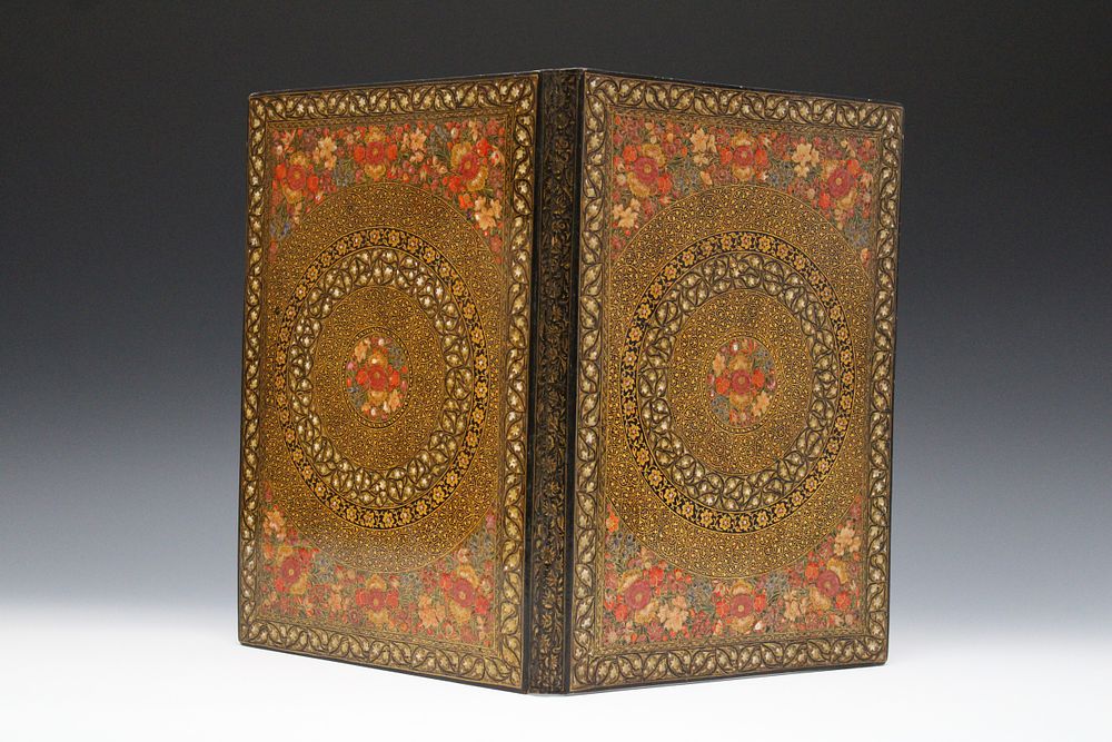 Lot 234: An Indian Kashmiri Paper Mache Book Cover, Circa...