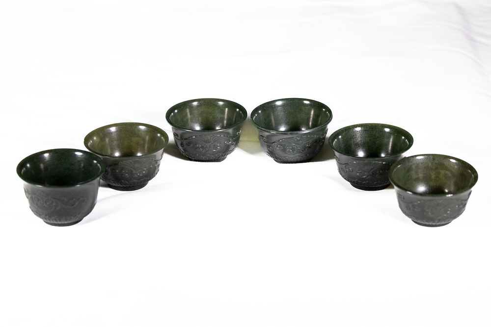 Lot 237: A Lot of Six Chinese Jade Miniatue Cups,...