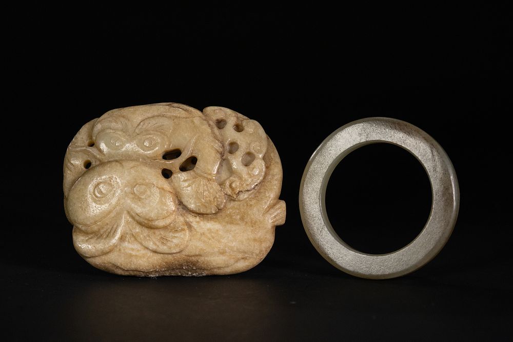 Lot 256: A Chinese Jade Toggle of a Mythical Beast...