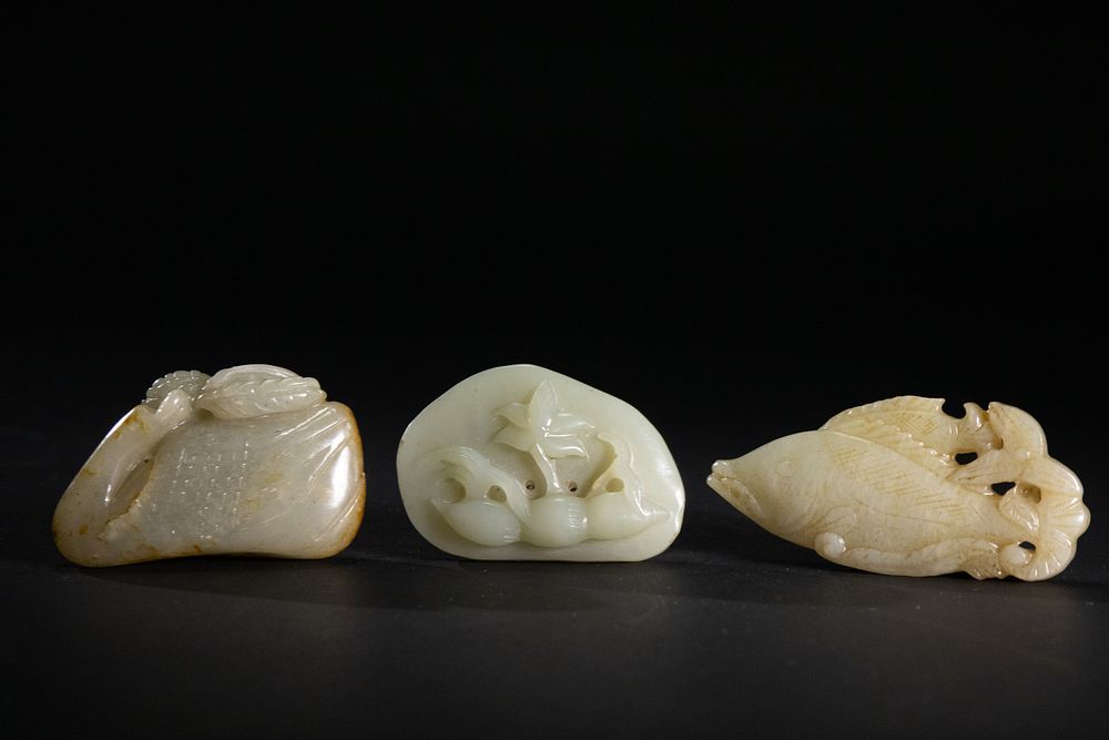 Lot 261: A Lot of Three Chinese Carved Jade Plaques.