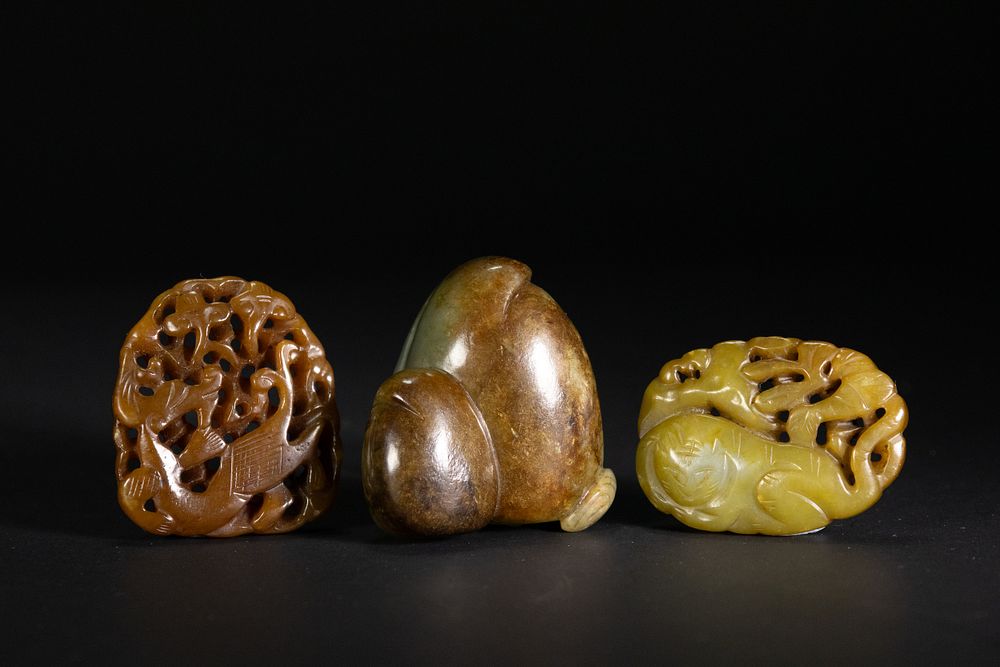 Lot 264: A Lot of Three Chinese Jade Carvings: Phoenix,...