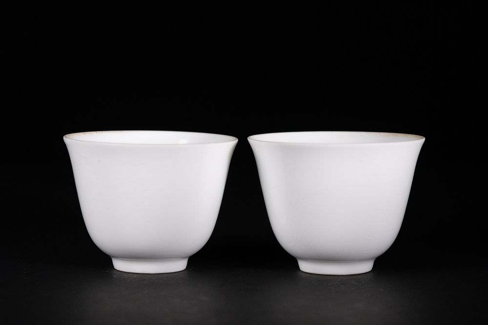 Lot 271: A Pair of Chinese White-Glazed Cups with Incised...