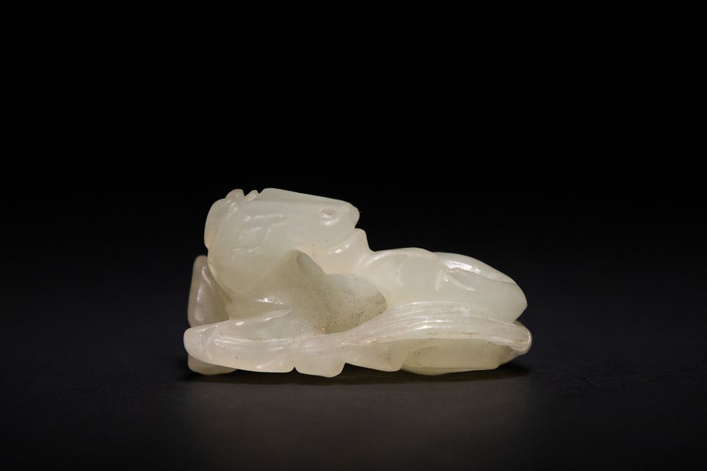 Lot 272: A Chinese Jade Carving of a Horse.