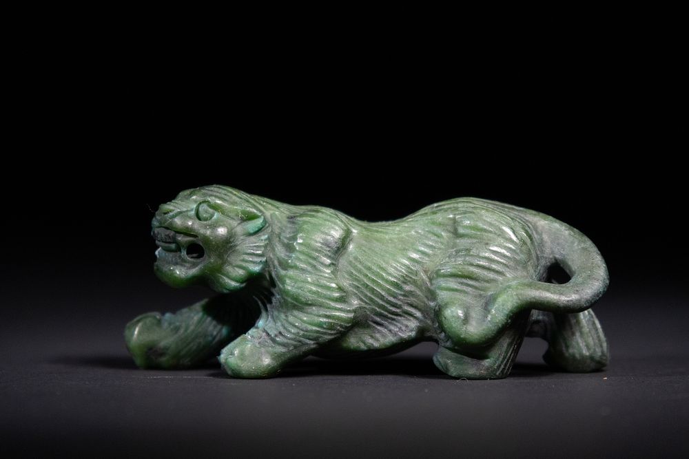 Lot 275: A Chinese Nephrite Jade Carving of a Tiger.