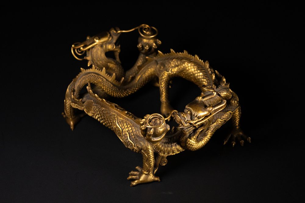 Lot 286: A Chinese Gilt Bronze Dragon Form Stand, Qing...