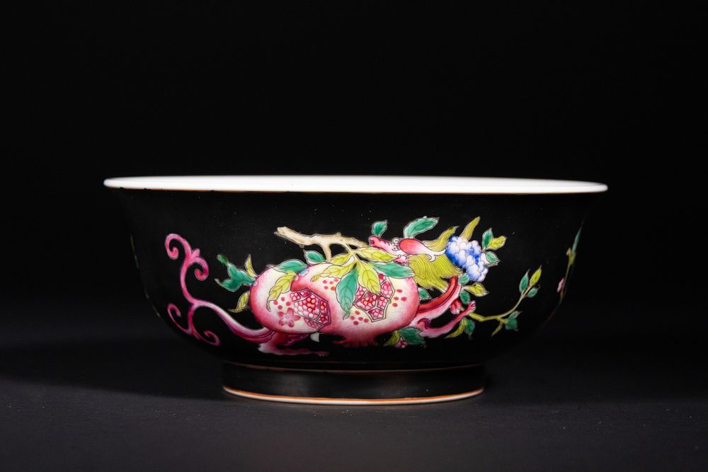 Lot 308: A Chinese Famille Noire Tea Bowl with Pomegranate...