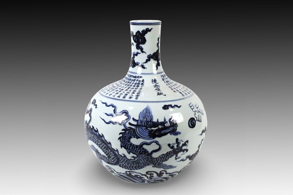 Lot 349: A Chinese Blue and White Porcelain Dragon Vase...