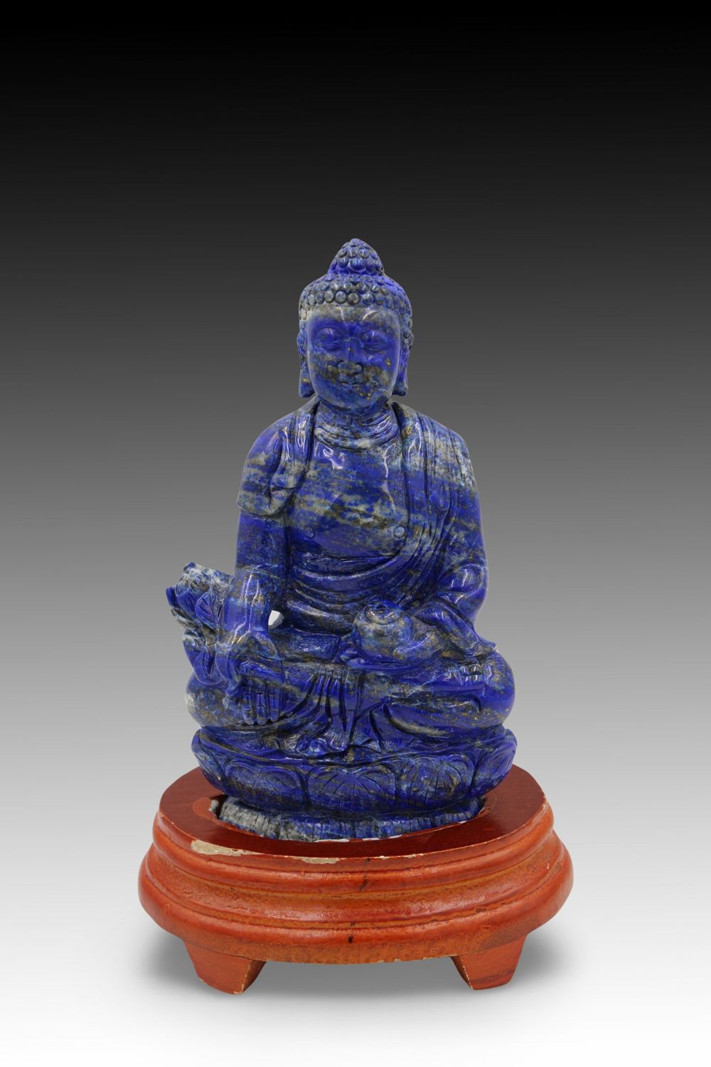 Lot 352: A Chinese Lapis Lazuli Seated Buddha on Lotus...