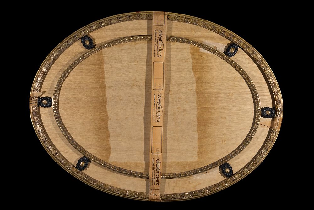 Lot 361: An Ornate Oval Gilt Picture Frame, 19th Century.